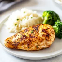 Juicy Air Fryer Chicken Breast cooked to perfection, no breading required.