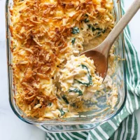 Creamy Monterey Chicken One Pan Orzo with chicken, spinach, and cheesy orzo in a baking dish.