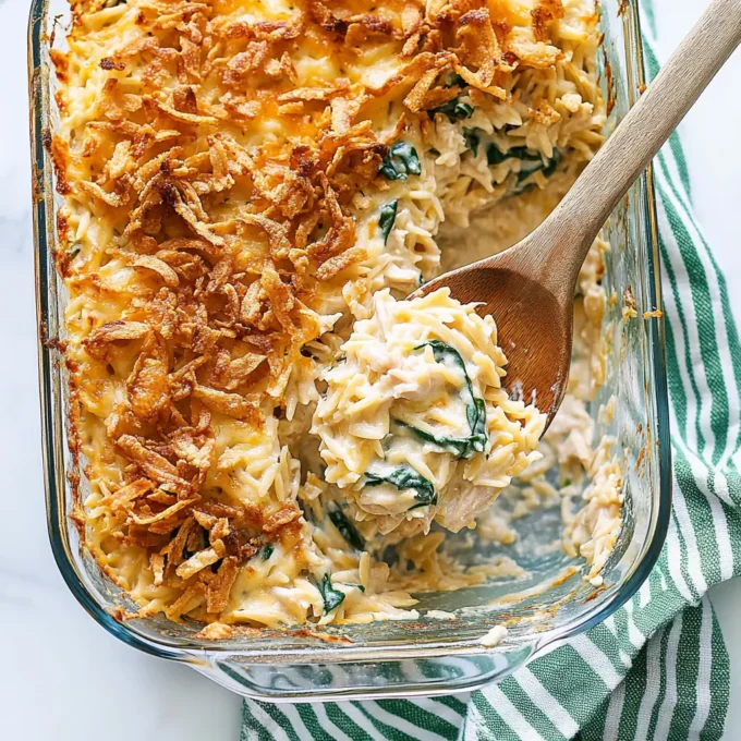 Creamy Monterey Chicken One Pan Orzo with chicken, spinach, and cheesy orzo in a baking dish.