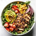 Delicious Honey Mustard Chicken Salad with grilled chicken, bacon, and avocado.